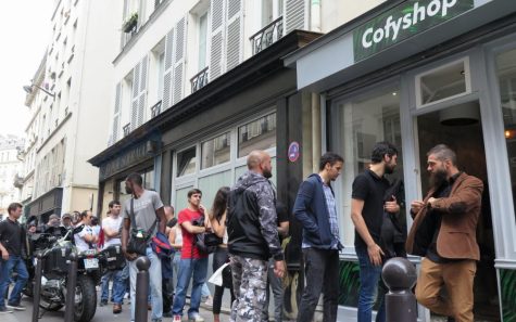 Customers queue to buy legal cannabis in Paris coffee shop